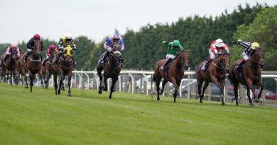 David Egan riding Toofi (right) win The Racing With Pride Handicap at Brighton Racecourse