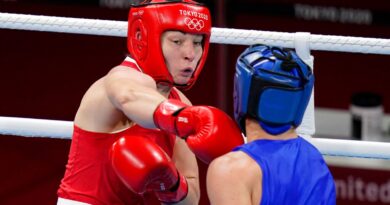 Britain...s Lauren Price, left, exchanges punches with Nouchka Fontlijn, of the Netherlands, during their women...s middleweight 75-kg boxing match at the 2020 Summer Olympics, Friday, Aug. 6, 2021, in Tokyo, Japan. (AP Photo/Frank Franklin II)