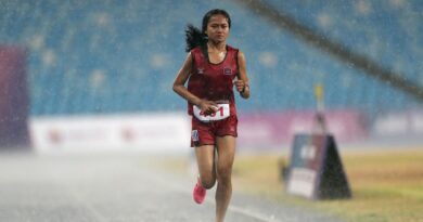 Video: Cambodian Runner Finishes Race Despite Torrential Rain