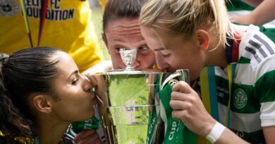 GLASGOW, SCOTLAND - MAY 28: Celtic's Jacynta Galabadaarachchi, Kelly Clark and Chloe Craig kiss the Scottish Cup during the Women's Scottish Cup Final match between Celtic and Rangers at Hampden Park, on May 28, 2023, in Glasgow, Scotland.  (Photo by Craig Williamson / SNS Group)