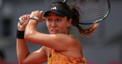 Jessica Pegula of the U.S. returns the ball against Marie Bouzkova, of the Czech Republic, during their match at the Madrid Open tennis tournament in Madrid, Spain, Sunday, April 30, 2023. (AP Photo/Manu Fernandez)