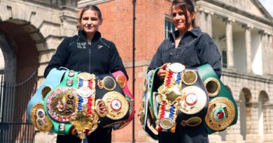 Katie Taylor the undisputed lightweight champion, left, and Chantelle Cameron, right, undisputed super-lightweight champion during a photo call at Dublin castle, Ireland, Thursday, May 18, 2023, ahead of their Undisputed Super Light-weight Championship in Dublin on Saturday. (AP Photo/Peter Morrison)