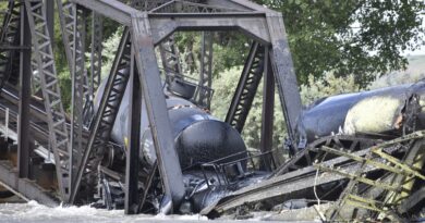 Train carrying hazardous materials derails and bridge collapses into Montana river