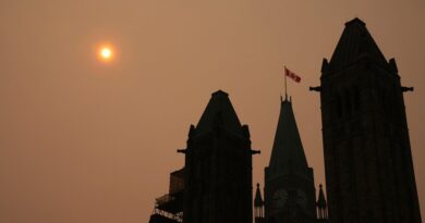 Orange and Smoky Skies Over a Province That Rolled Back Climate Measures