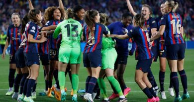 Barcelona players celebrate after reaching the final of the UEFA Women's Champions League following a 2-1 aggregate win over Chelsea