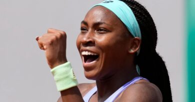 Coco Gauff of the U.S.celebrates her win over Estonia's Kaia Kanepi during their third round match of the French Open tennis tournament at the Roland Garros stadium Friday, May 27, 2022 in Paris. Gauff won 6-3, 6-4. (AP Photo/Christophe Ena)