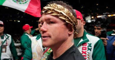 Saul "Canelo" Alvarez of Mexico celebrates after defeating John Ryder of Britain in their super middleweight title boxing match at the Akron Stadium in Guadalajara, Mexico, Saturday, May 6, 2023. (AP Photo/Moises Castillo)