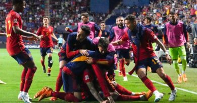 Spain players celebrate after Spain's Joselu scored