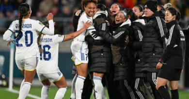 Philippines' Sarina Bolden, centre, is congratulated by teammates after scoring her teams first goal during the Women's World Cup Group A soccer match between New Zealand and the Philippines in Wellington, New Zealand, Tuesday, July 25, 2023. (AP Photo/Andrew Cornaga)